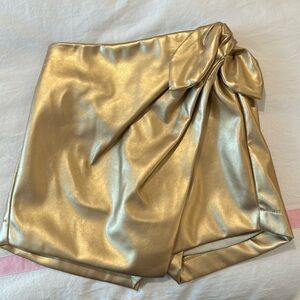 Girls Gold Pleather bow tie skort. Worn 2x. Size 7-8.